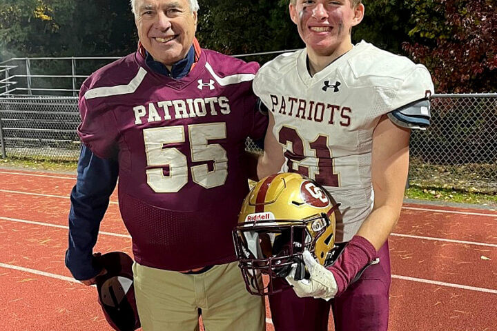 Joe Martines Concord High School class of 1955 (left) with grandson Concord-Carlisle senior Ryan Martines after C-C’s win over Acton-Boxborough