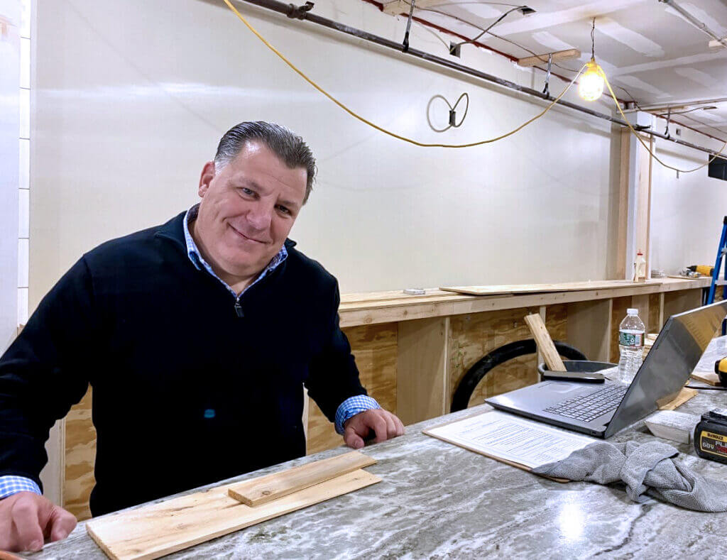 Richard Abbott stands behind the new bar at the West Village Tavern. The restaurant is in the final stages of its renovation. - Photos by Margaret Carroll-Bergman
