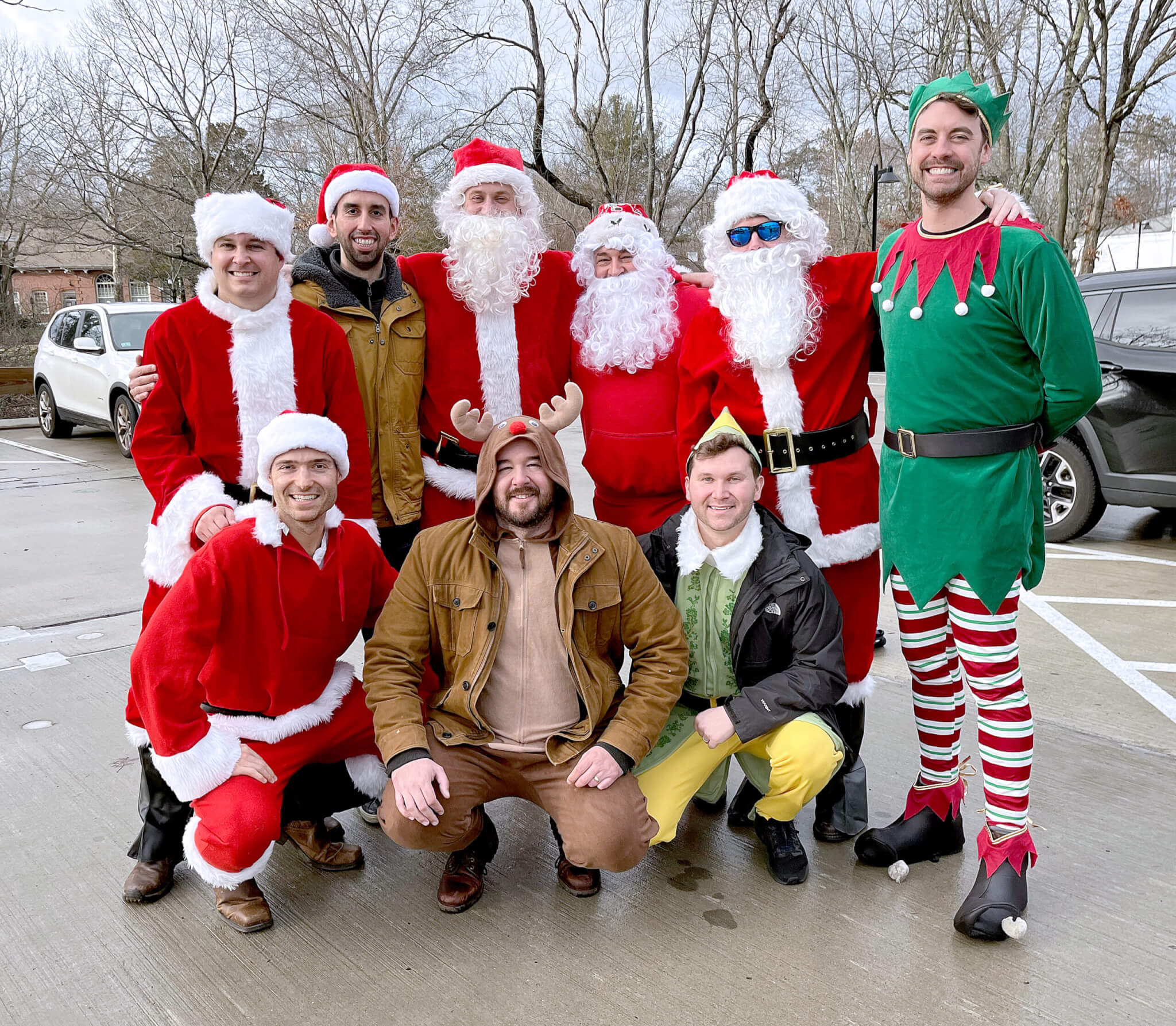 Top Left: John Palusci, Marco Beltran, Mike Julian, Dan Healy, Charles O'Malley, and the Elf is Brian Burkhard. Bottom Left: Ross Collins, James Hogan (reindeer) and Patrick Cooper.